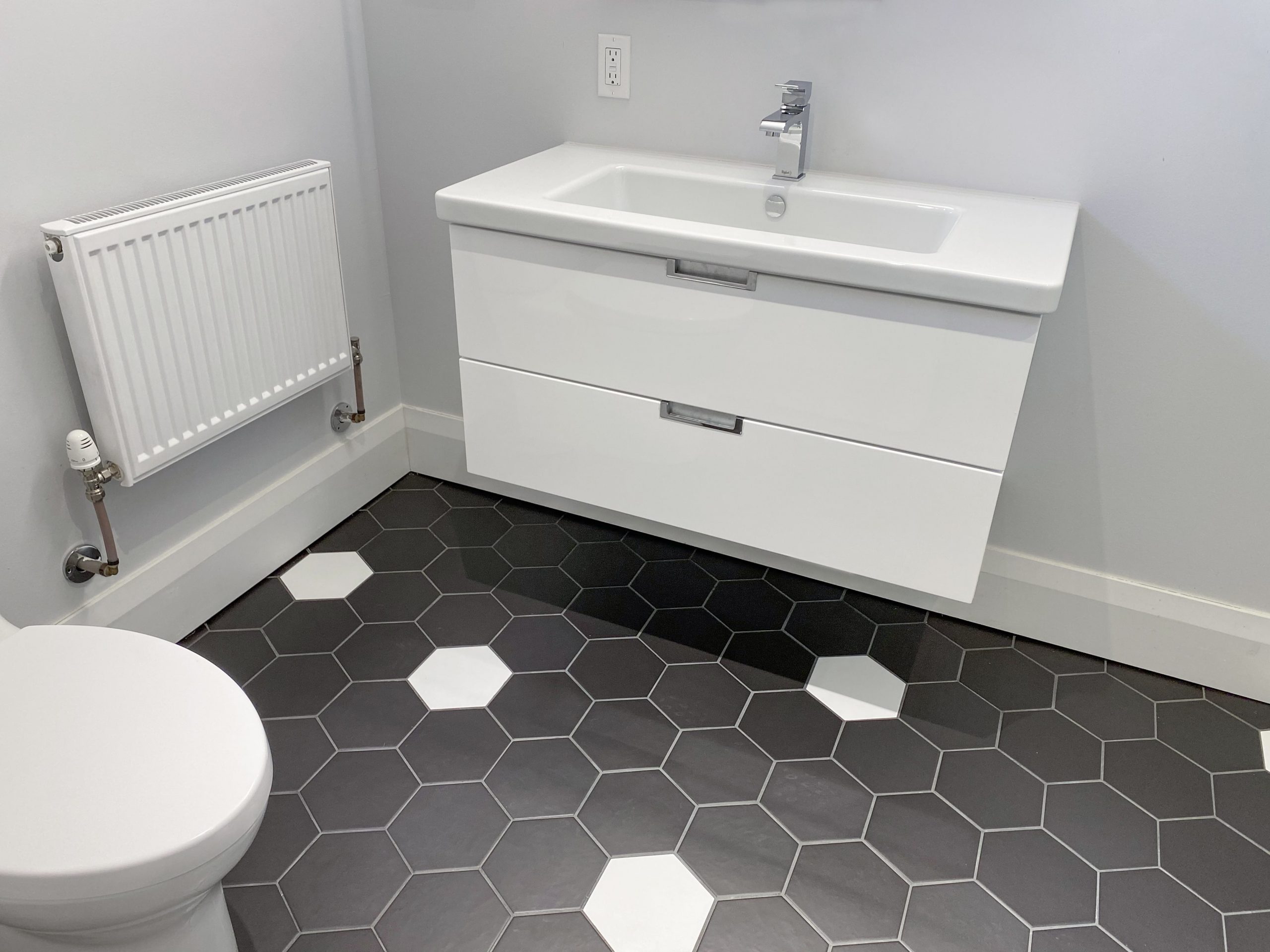 Woodthorpe Rd. – Victoria Park Village Basement Bathroom - Featured Image
